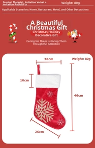 Detailed view of red Christmas stocking with gold snowflake embroidery and plush white cuff