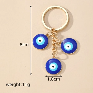 Blue evil eye keychain with heart tassel charms, 8cm length and 11g lightweight design