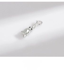 Close-up of a 925 sterling silver owl charm pendant with sparkling cubic zirconia stones