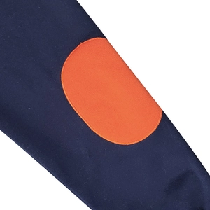 Detail of navy blue sweatshirt sleeve featuring a contrast orange elbow patch and cotton texture
