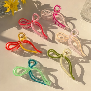 Colorful jelly butterfly hair claws set made of transparent acrylic in diverse vibrant shades