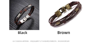 Detail of woven leather bracelets in black and brown with vintage metallic alloy clasps
