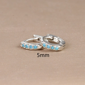 Close-up of S925 silver earring with blue zircon stone and 5mm diameter marking