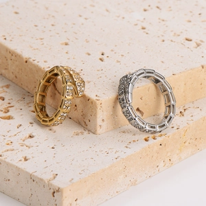 Elegant gold and silver stainless steel snake scale rings with sparkling crystal pavé