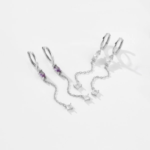 Detail view of S925 silver long tassel earrings with purple and clear marquise zircons