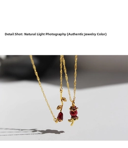 Detail shot of vintage 3D red enamel rose pendants with 18k gold plated brass chain
