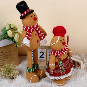 Christmas gingerbread man chef dolls set in festive home decor with warm lighting