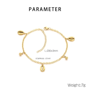 Detail of 18K gold plated stainless steel anklet with shell charms and bead pendants
