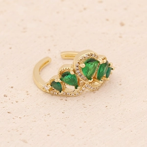 Elegant gold crown ring with green pear-cut gemstones and sparkling pavé crystals