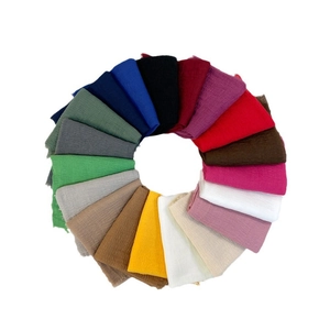 Linen cotton scarf in multiple colors featuring frayed edges and natural crinkle texture