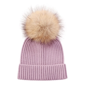 Detail of purple ribbed knit beanie for children with soft faux fur pompom for winter warmth