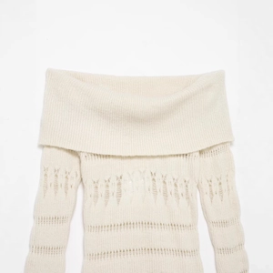 White hollow-out off-shoulder knit sweater with elegant openwork patterns for women