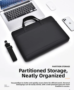 Detailed view of black business laptop bag with reinforced handles and adjustable strap