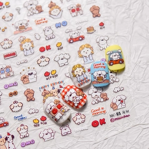 Close-up of cute cartoon dog nail stickers on a white textured background