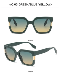 Detail view of square green resin sunglasses with gradient lenses and gold temple hinge