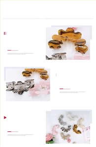 Detail of large acrylic claw clip showing the strong metal spring and wide opening design