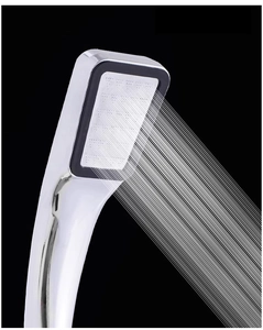 Close-up of square high-pressure shower head with 300 holes and chrome finish