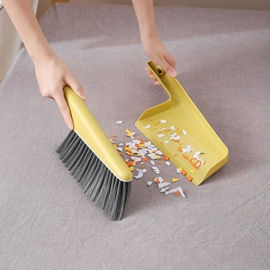 Mini handheld broom and dustpan set with soft bristles for household surface cleaning