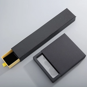 Elegant black drawer jewelry boxes with textured finish for necklaces and rings