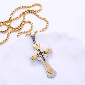 Two-tone layered cross pendant necklace in gold and silver with rhinestones and box chain