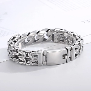 Detailed view of silver stainless steel men's chain with retro Byzantine links and heavy clasp