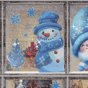 Blue glitter Christmas window stickers featuring snowman and snowflake holiday decals