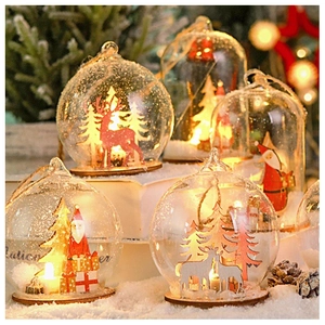 Luminous glass dome Christmas ornaments with wooden reindeer and Santa Claus scenes