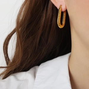 Elegant gold U-shaped long twisted earrings with textured rope design for women