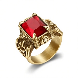 Vintage gold stainless steel men's ring with large red rectangular gemstone in center