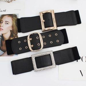 Three classic black wide elastic waist belts with gold buckles and rhinestone accents