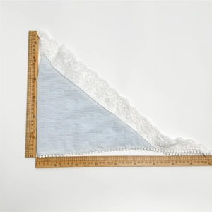 Size measurement of light blue lace bandana with white pom-pom fringe and floral details