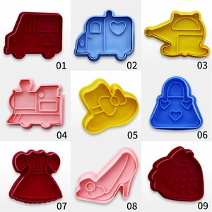 Detailed 3x3 grid layout of 9 plastic cookie cutters in various festive shapes and colors