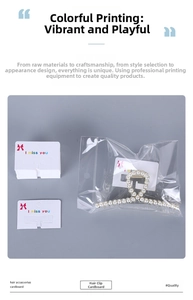White cardboard hair claw display cards with red bow logo and I miss you print