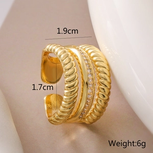 Detailed view of layered 18K gold plated copper ring with sparkling zircon inlays