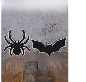 Detail of wooden Halloween bat and spider desk signs with Welcome and Halloween text