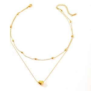 Double-layered gold titanium steel heart pendant necklace with beaded chain detail