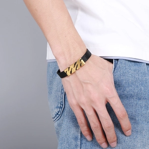 Bracelet hip-hop pour homme en tressé noir avec ornement d'étoile en métal doré