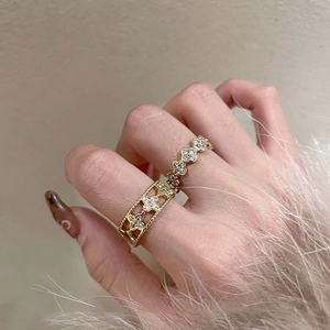 Elegant gold double-layer clover open ring set with sparkling cubic zirconia accents