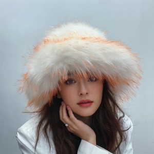 Close-up of fluffy white and orange faux fur hat showing thick texture and punk style
