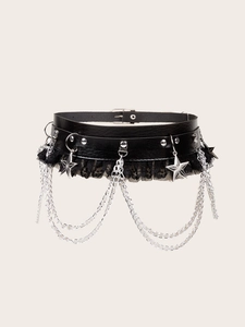 Close-up of black punk waist belt with silver chains, star charms and lace details
