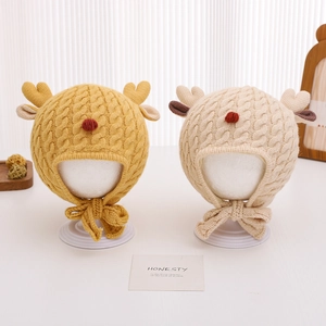 Charming baby knitted earflap hats with reindeer antlers and pompom in yellow and beige