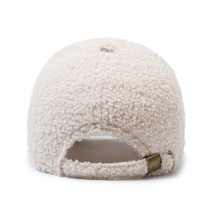 Back view of plush sherpa baseball cap in creamy white with adjustable metal buckle