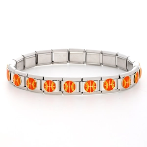 Detail of silver modular stainless steel bracelet with orange basketball charms