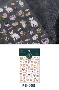 Close-up of FS-059 3D cartoon cat and floral nail art stickers with matte texture