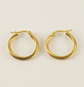 Detailed view of 18K gold plated stainless steel twisted rope hoop earrings texture