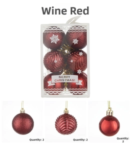 Macro detail of wine red Christmas ornaments featuring shiny, textured, and glitter finishes