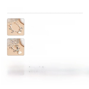 Detail showing shell star and pearl beach necklace specs with alloy and ceramic textures