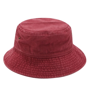 Classic washed cotton bucket hat in deep red with metal eyelets and reinforced brim
