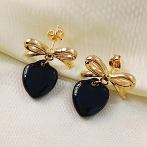 Elegant 18K gold-plated stainless steel earrings with black heart and bow pendants