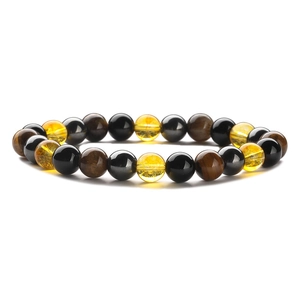 Tiger eye and crystal elastic beaded bracelet with polished brown and black round stones